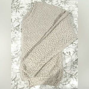 Hippie Rose v-neck front and back sweater in the color oatmeal